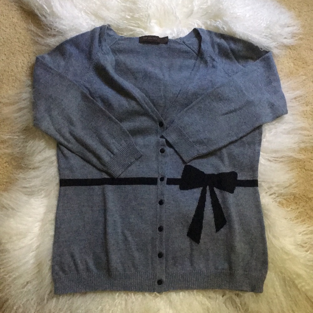 Limited cardigan with bow